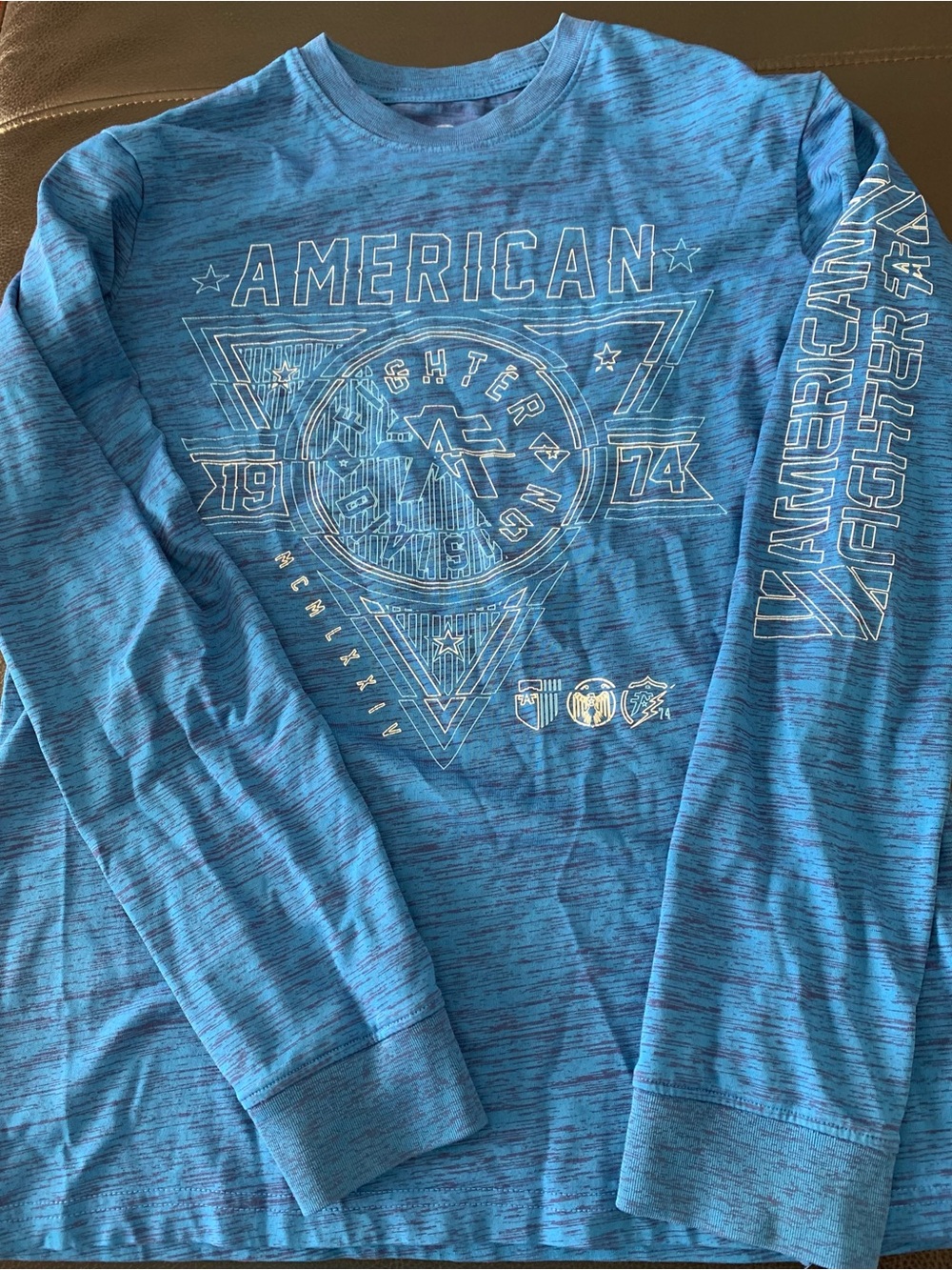 American Fighter Men’s Long Sleeve Tee in Heathered Blue with White Print